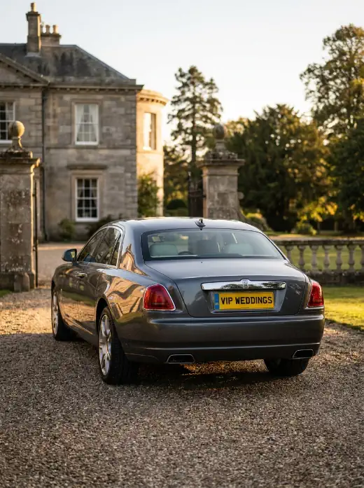 Wedding car hire company London — chauffeur-driven car rear view